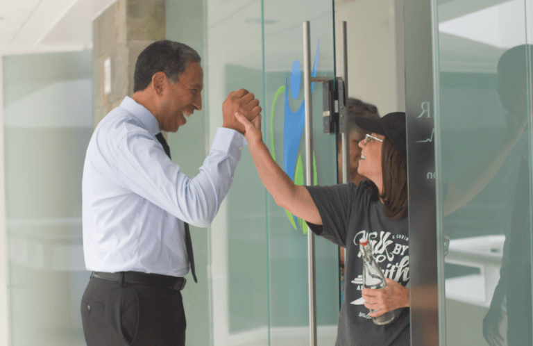 Dr Tony High Fives A Patient